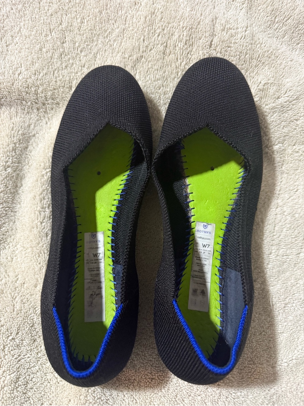 Rothy's Black Knit Flats with Neon Green Insole and Blue Trim